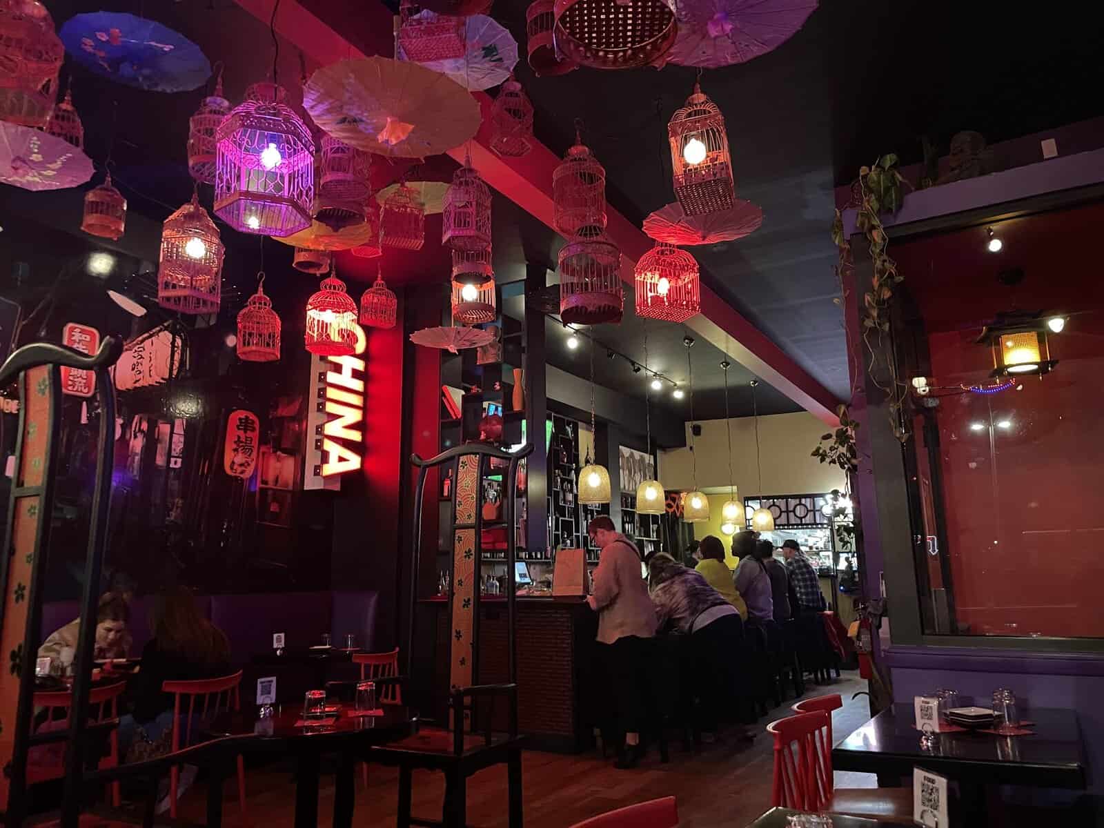 Guests seated at tables inside Bendi Wok n Bar in German Village
