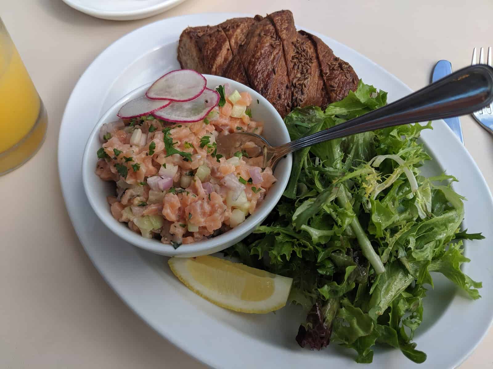 Salmon tartare with a croissant at a German Village bakery