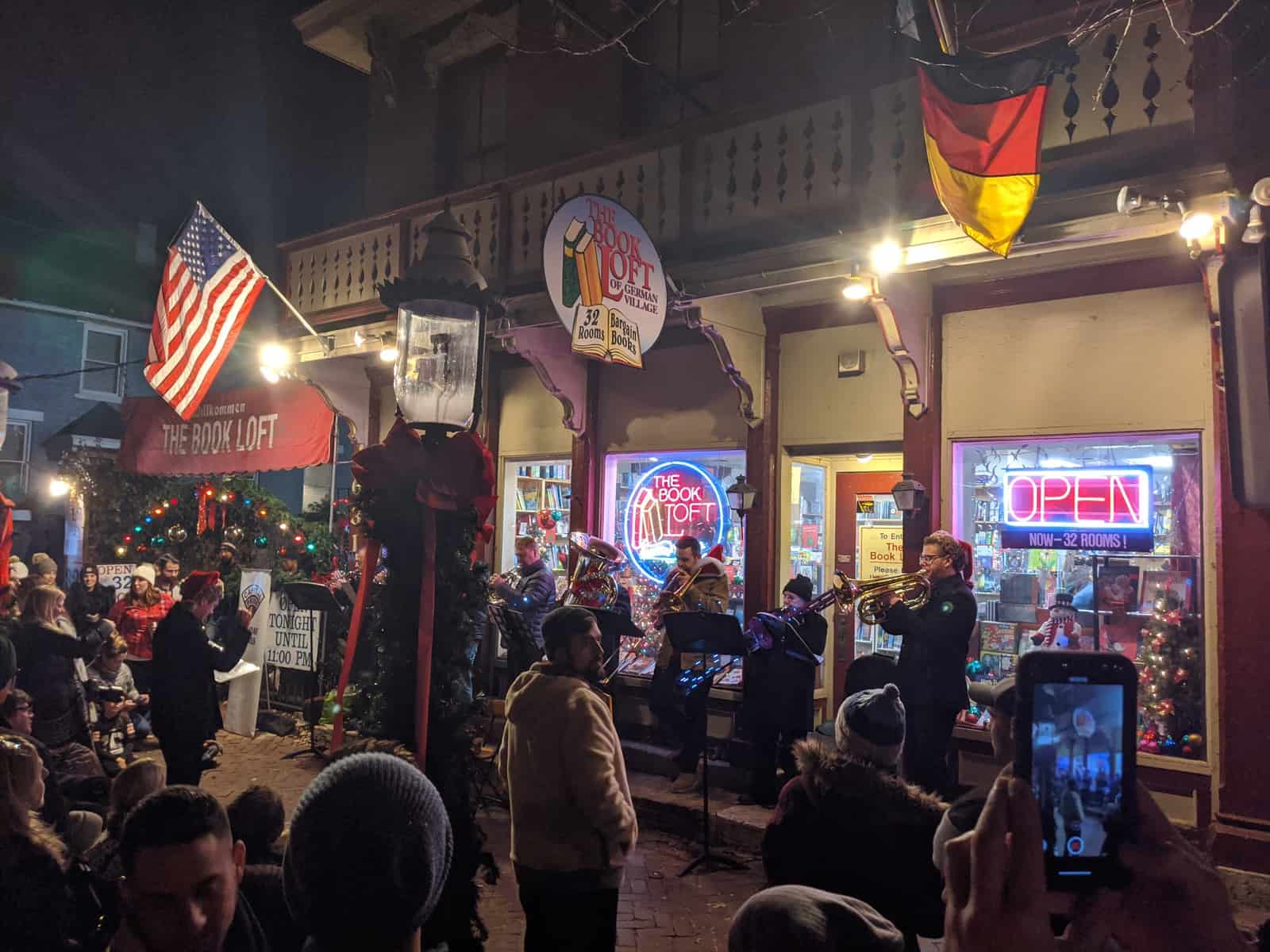 A band performing on the street during Village Lights